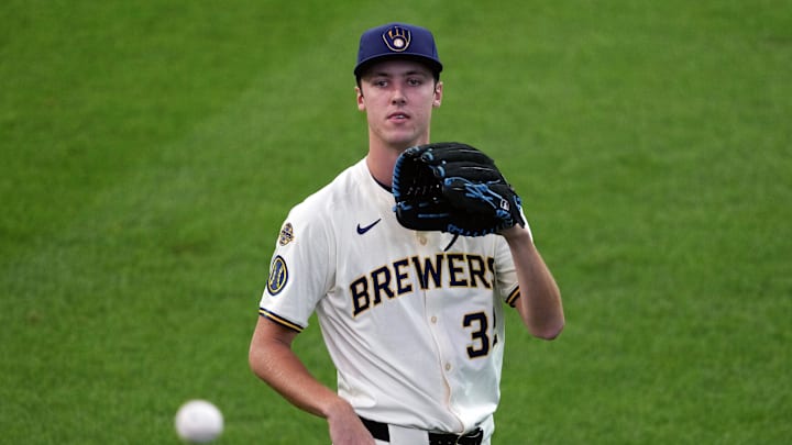 Jul 8, 2025; Milwaukee, Wisconsin, USA;  Milwaukee Brewers pitcher Jacob Misiorowski (32) warms up in the outfield prior to the game against the Los Angeles Dodgers at American Family Field. Mandatory Credit: Jeff Hanisch-Imagn Images