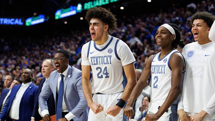 Feb 7, 2026; Lexington, Kentucky, USA; Kentucky Wildcats center Malachi Moreno (24), guard Jasper Johnson (2) and forward Braydon Hawthorne (right) celebrate from the bench during the second half against the Tennessee Volunteers at Rupp Arena at Central Bank Center. Mandatory Credit: Jordan Prather-Imagn Images