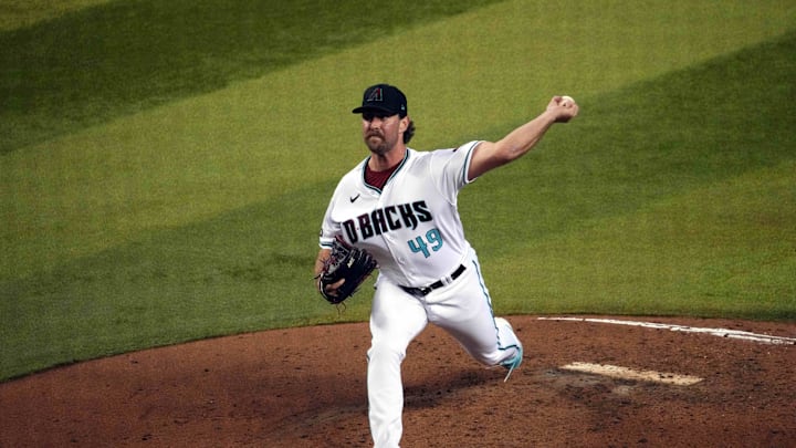 Arizona Diamondbacks relief pitcher Tyler Gilbert (49) pitches against the Seattle Mariners during the sixth inning at Chase Field in 2023.