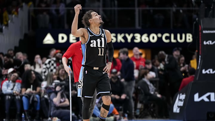 Feb 12, 2024; Atlanta, Georgia, USA; Atlanta Hawks guard Trae Young (11) gestures after being called Feb 12, 2024; Atlanta, Georgia, USA; Atlanta Hawks guard Trae Young (11) gestures after being called
