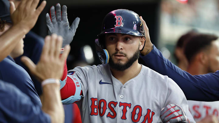 Boston Red Sox outfielder Wilyer Abreu (52) receives congratulations from teammates after he hits a home run sixth inning against the Detroit Tigers at Comerica Park on May 12. Boston Red Sox outfielder Wilyer Abreu (52) receives congratulations from teammates after he hits a home run sixth inning against the Detroit Tigers at Comerica Park on May 12.