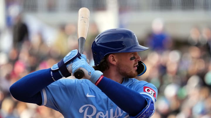 Mar 17, 2024; Surprise, Arizona, USA; Kansas City Royals shortstop Bobby Witt Jr. (7) bats against