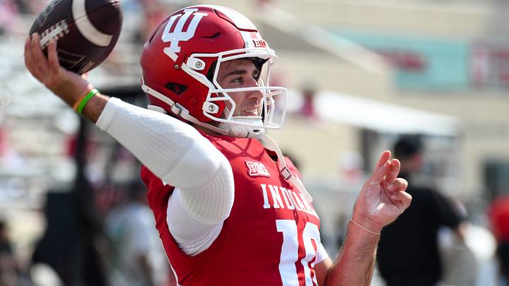 Sep 19, 2026; Bloomington, Indiana, USA; Indiana Hoosiers quarterback Josh Hoover (10) warms up prior to the game against the Western Kentucky Hilltoppers at Merchants Bank Field at Memorial Stadium. Mandatory Credit: Robert Goddin-Imagn Images