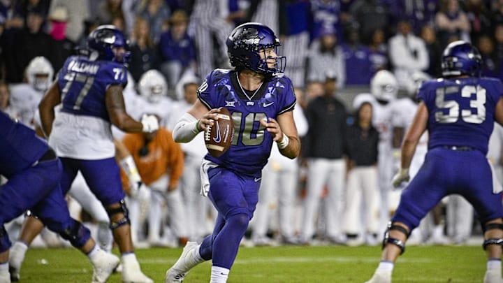 Nov 11, 2023; Fort Worth, Texas, USA; TCU Horned Frogs quarterback Josh Hoover (10) rolls out
