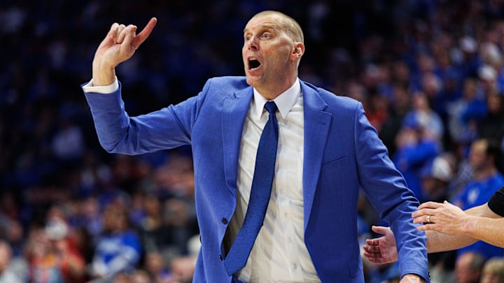 Dec 13, 2025; Lexington, Kentucky, USA;  Kentucky Wildcats head coach Mark Pope yells to his players during the second half against the Indiana Hoosiers at Rupp Arena at Central Bank Center. Mandatory Credit: Jordan Prather-Imagn Images