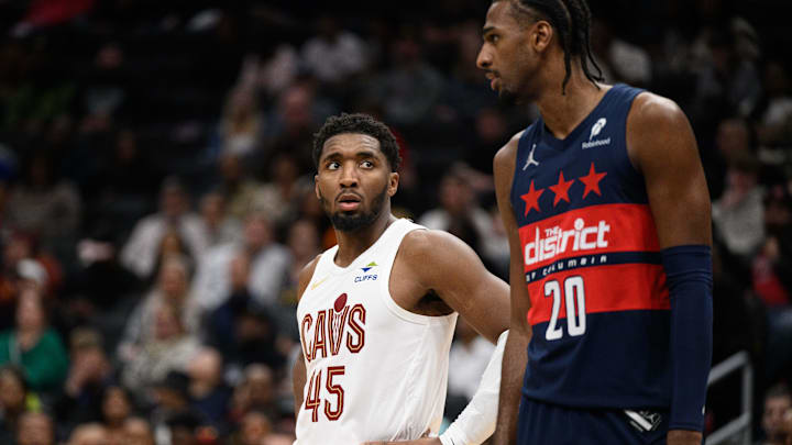 Oct 26, 2024; Washington, District of Columbia, USA; Cleveland Cavaliers guard Donovan Mitchell (45) and Washington Wizards forward Alexandre Sarr (20) talk at the free throw line during the fourth quarter at Capital One Arena. Mandatory Credit: Reggie Hildred-Imagn Images Oct 26, 2024; Washington, District of Columbia, USA; Cleveland Cavaliers guard Donovan Mitchell (45) and Washington Wizards forward Alexandre Sarr (20) talk at the free throw line during the fourth quarter at Capital One Arena. Mandatory Credit: Reggie Hildred-Imagn Images