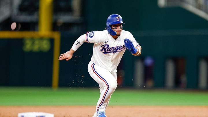 Jul 22, 2026; Arlington, Texas, USA; Texas Rangers left fielder Alejandro Osuna (19) heads to third base during the third inning against the Chicago White Sox at Globe Life Field. Mandatory Credit: Andrew Dieb-Imagn Images