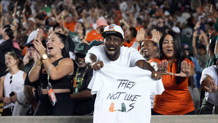 Oct 5, 2024; Berkeley, California, USA; Miami Hurricanes fans cheer during the fourth quarter against the California Golden Bears at California Memorial Stadium. Mandatory Credit: Darren Yamashita-Imagn Images