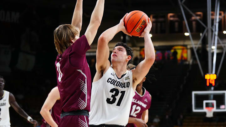 Dec 21, 2024; Boulder, Colorado, USA; Colorado Buffaloes guard Harrison Carrington (31) shoots the ball at Bellarmine Knights guard AJ Lux (0) in the second half at CU Events Center. Mandatory Credit: Ron Chenoy-Imagn Images