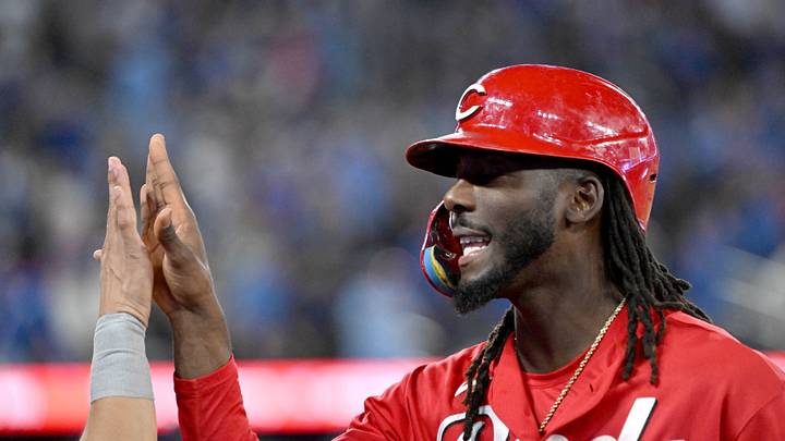 Sep 25, 2026; Toronto, Ontario, CAN; Cincinnati Reds designated hitter Elly De La Cruz (44) is greeted by a teammate as he comes off the field in the seventh inning against the Toronto Blue Jays at Rogers Centre. Mandatory Credit: Dan Hamilton-Imagn Images Sep 25, 2026; Toronto, Ontario, CAN; Cincinnati Reds designated hitter Elly De La Cruz (44) is greeted by a teammate as he comes off the field in the seventh inning against the Toronto Blue Jays at Rogers Centre. Mandatory Credit: Dan Hamilton-Imagn Images