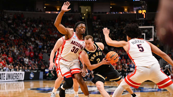 Mar 28, 2026; San Jose, CA, USA; Purdue Boilermakers guard Fletcher Loyer (2) drives to the basket defended by Arizona Wildcats forward Tobe Awaka (30) and guard Brayden Burries (5) in the second half during an Elite Eight game of the West Regional of the men's 2026 NCAA Tournament at SAP Center. Mandatory Credit: Eakin Howard-Imagn Images