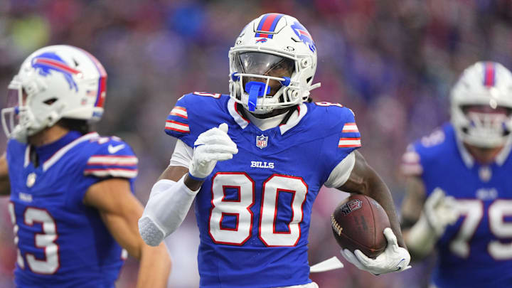 Dec 29, 2024; Orchard Park, New York, USA; Buffalo Bills wide receiver Tyrell Shavers (80) runs with the ball after making a catch and scores a touchdown