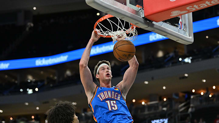 Oct 14, 2025; Milwaukee, Wisconsin, USA; Oklahoma City Thunder center Branden Carlson (15) dunks against the Milwaukee Bucks during the second half at Fiserv Forum. Mandatory Credit: Patrick Gorski-Imagn Images Oct 14, 2025; Milwaukee, Wisconsin, USA; Oklahoma City Thunder center Branden Carlson (15) dunks against the Milwaukee Bucks during the second half at Fiserv Forum. Mandatory Credit: Patrick Gorski-Imagn Images
