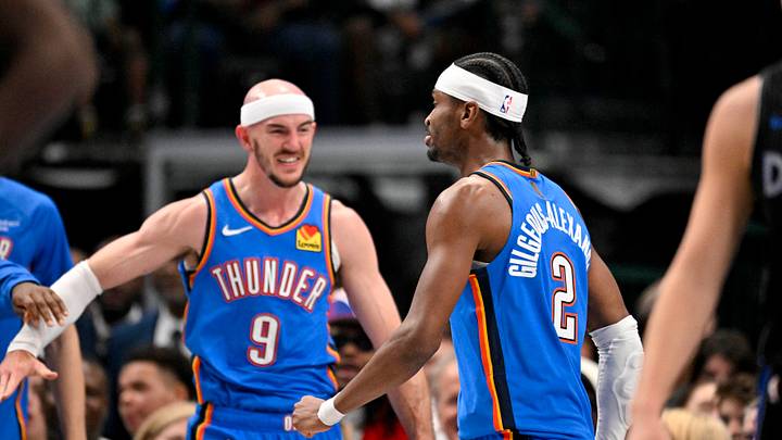 Mar 1, 2026; Dallas, Texas, USA; Oklahoma City Thunder guard Alex Caruso (9) and guard Shai Gilgeous-Alexander (2) celebrate after Gilgeous-Alexander dunks the ball against the Dallas Mavericks during the second quarter at the American Airlines Center. Mandatory Credit: Jerome Miron-Imagn Images Mar 1, 2026; Dallas, Texas, USA; Oklahoma City Thunder guard Alex Caruso (9) and guard Shai Gilgeous-Alexander (2) celebrate after Gilgeous-Alexander dunks the ball against the Dallas Mavericks during the second quarter at the American Airlines Center. Mandatory Credit: Jerome Miron-Imagn Images
