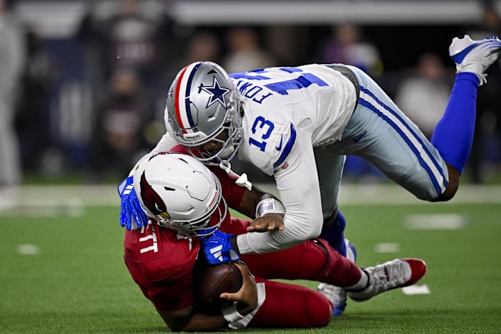 Dallas Cowboys defensive end Dante Fowler Jr. sacks Arizona Cardinals quarterback Jacoby Brissett.