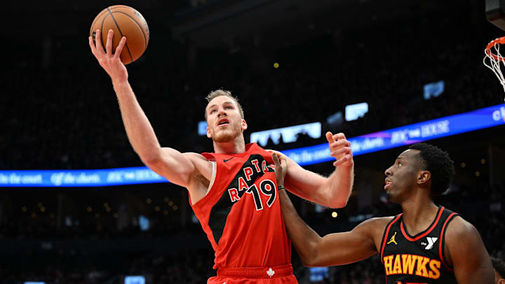 Dec 29, 2024; Toronto, Ontario, CAN; Toronto Raptors center Jakob Poeltl catches a rebound against Atlanta Hawks forward Onyeka Okongwu (17) in the second half at Scotiabank Arena. Mandatory Credit: Dan Hamilton-Imagn Images Dec 29, 2024; Toronto, Ontario, CAN; Toronto Raptors center Jakob Poeltl catches a rebound against Atlanta Hawks forward Onyeka Okongwu (17) in the second half at Scotiabank Arena. Mandatory Credit: Dan Hamilton-Imagn Images