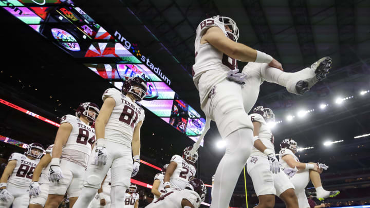 Dec 27, 2023; Houston, TX, USA; Texas A&M Aggies wide receiver Chase Burton (85) and teammates