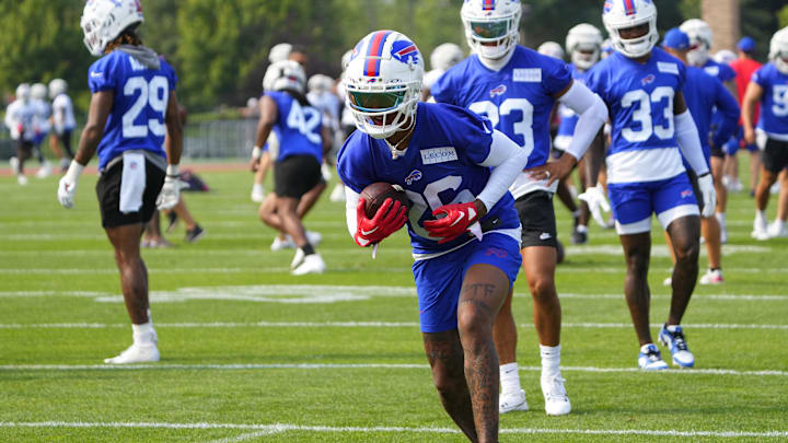 Buffalo Bills cornerback Cameron Dantzler (26) participates in drills in on the field during training camp at St. John Fisher College in 2023. Buffalo Bills cornerback Cameron Dantzler (26) participates in drills in on the field during training camp at St. John Fisher College in 2023.