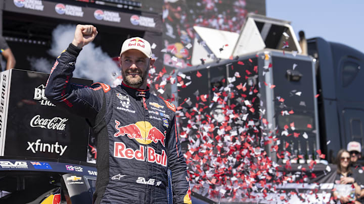 Jul 13, 2025; Sonoma, California, USA;  NASCAR Cup Series driver Shane van Gisbergen (88) celebrates after winning the NASCAR Toyota / Save Mart 350 at Sonoma Raceway. Mandatory Credit: Stan Szeto-Imagn Images
