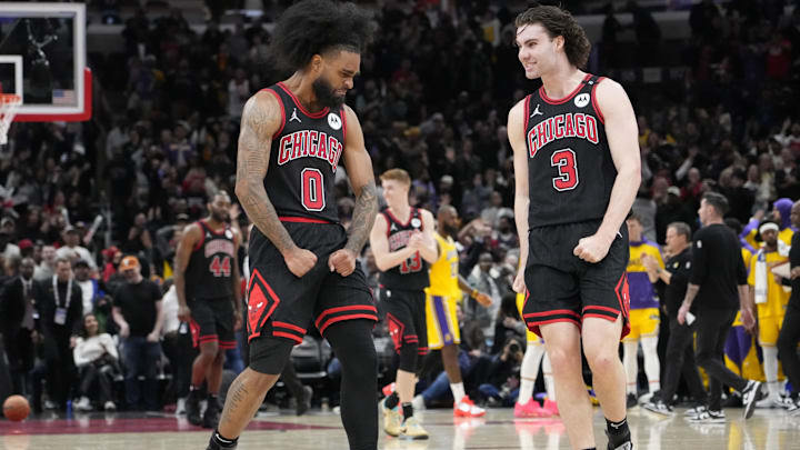 Mar 27, 2025; Chicago, Illinois, USA; Chicago Bulls guard Coby White (0) celebrates his three point basket against the Los Angeles Lakers with guard Josh Giddey (3) during the second half at United Center. Mandatory Credit: David Banks-Imagn Images Mar 27, 2025; Chicago, Illinois, USA; Chicago Bulls guard Coby White (0) celebrates his three point basket against the Los Angeles Lakers with guard Josh Giddey (3) during the second half at United Center. Mandatory Credit: David Banks-Imagn Images