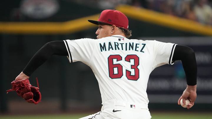 May 26, 2025; Phoenix, Arizona, USA; Arizona Diamondbacks pitcher Justin Martinez (63) pitches against the Pittsburgh Pirates during the eighth inning at Chase Field. Mandatory Credit: Joe Camporeale-Imagn Images May 26, 2025; Phoenix, Arizona, USA; Arizona Diamondbacks pitcher Justin Martinez (63) pitches against the Pittsburgh Pirates during the eighth inning at Chase Field. Mandatory Credit: Joe Camporeale-Imagn Images