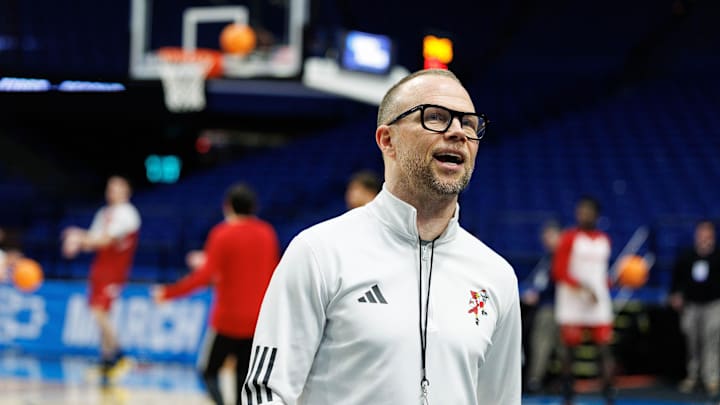 Mar 19, 2025; Lexington, KY, USA; Louisville Cardinals head coach Pat Kelsey talks to media members on the sideline during practice at Rupp Arena. Mandatory Credit: Jordan Prather-Imagn Images Mar 19, 2025; Lexington, KY, USA; Louisville Cardinals head coach Pat Kelsey talks to media members on the sideline during practice at Rupp Arena. Mandatory Credit: Jordan Prather-Imagn Images