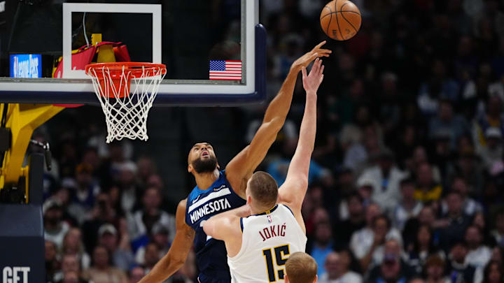 Minnesota Timberwolves center Rudy Gobert blocks the shot of Denver Nuggets center Nikola Jokic in the second quarter at Ball Arena in Denver on March 12, 2025.