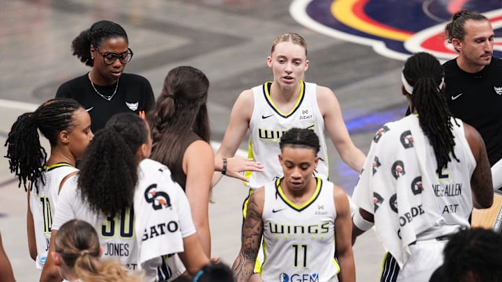 Dallas Wings guard Paige Bueckers (5) walks off the court during a timeout on Sunday, July 13, 2025, during the game at Gainbridge Fieldhouse in Indianapolis.
