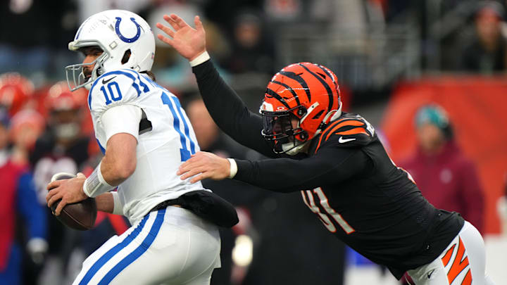 Cincinnati Bengals defensive end Trey Hendrickson (91) sacks Indianapolis Colts quarterback Gardner Minshew (10) in the fourth quarter during a Week 14 NFL game between the Indianapolis Colts and the Cincinnati Bengals, Sunday, Dec. 10, 2023, at Paycor Stadium in Cincinnati. Cincinnati Bengals defensive end Trey Hendrickson (91) sacks Indianapolis Colts quarterback Gardner Minshew (10) in the fourth quarter during a Week 14 NFL game between the Indianapolis Colts and the Cincinnati Bengals, Sunday, Dec. 10, 2023, at Paycor Stadium in Cincinnati.