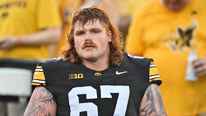 Sep 13, 2025; Iowa City, Iowa, USA; Iowa Hawkeyes offensive lineman Gennings Dunker (67) looks on before the game against the Massachusetts Minutemen at Kinnick Stadium. Mandatory Credit: Jeffrey Becker-Imagn Images