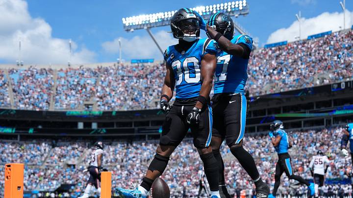 Carolina Panthers running back Chuba Hubbard (30) celebrates with wide receiver Xavier Legette Carolina Panthers running back Chuba Hubbard (30) celebrates with wide receiver Xavier Legette