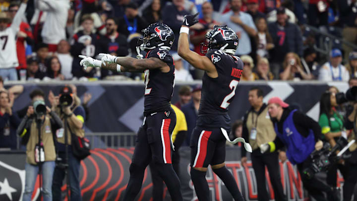 Jan 11, 2025; Houston, Texas, USA; Houston Texans wide receiver Nico Collins (12) celebrates during the second quarter against the Los Angeles Chargers in an AFC wild card game at NRG Stadium. Mandatory Credit: Troy Taormina-Imagn Images Jan 11, 2025; Houston, Texas, USA; Houston Texans wide receiver Nico Collins (12) celebrates during the second quarter against the Los Angeles Chargers in an AFC wild card game at NRG Stadium. Mandatory Credit: Troy Taormina-Imagn Images