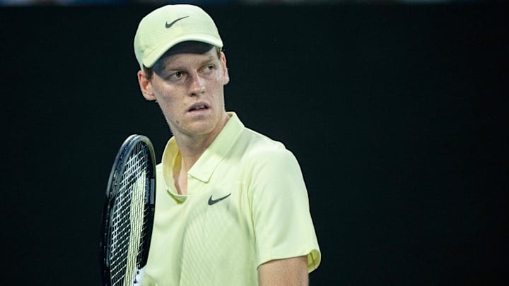 Jannik Sinner reacts during his match against Marcos Giron in the 2025 Australian Open.