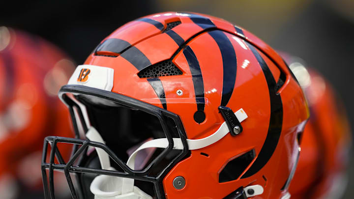 Oct 12, 2025; Green Bay, Wisconsin, USA;  General view of Cincinnati Bengals helmets on the sidelines prior to the game against the Green Bay Packers at Lambeau Field. Mandatory Credit: Jeff Hanisch-Imagn Images