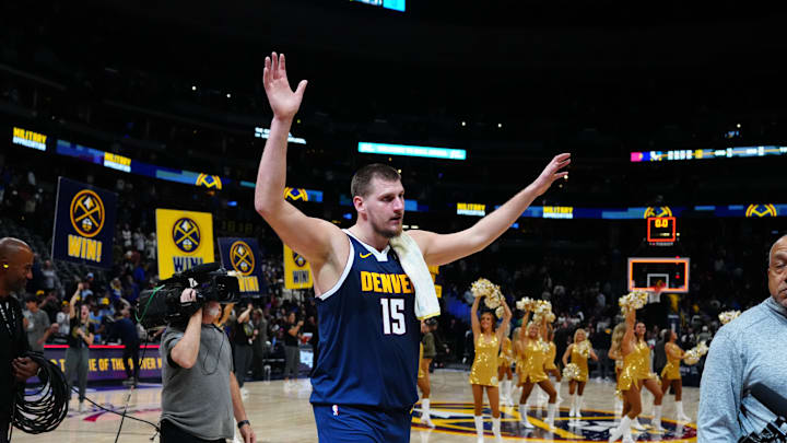 Nov 10, 2024; Denver, Colorado, USA; Denver Nuggets center Nikola Jokic (15) following the win over the Dallas Mavericks at Ball Arena. Mandatory Credit: Ron Chenoy-Imagn Images