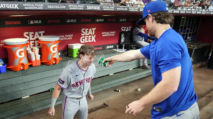 May 9, 2026; Phoenix, Arizona, USA; New York Mets pitcher Nolan McLean (26) throws water on left fielder Carson Benge (3) before a game against the Arizona Diamondbacks at Chase Field. Mandatory Credit: Rick Scuteri-Imagn Images May 9, 2026; Phoenix, Arizona, USA; New York Mets pitcher Nolan McLean (26) throws water on left fielder Carson Benge (3) before a game against the Arizona Diamondbacks at Chase Field. Mandatory Credit: Rick Scuteri-Imagn Images