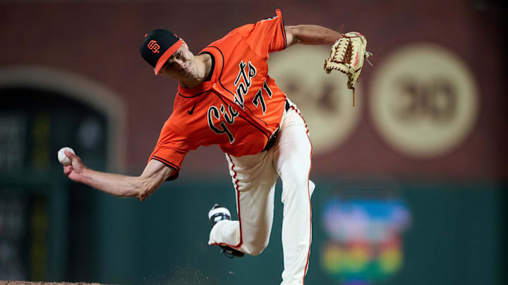 San Francisco, California, USA; San Francisco Giants pitcher Tyler Rogers (71) throws a pitch against the Atlanta Braves during the eighth inning at Oracle Park. San Francisco, California, USA; San Francisco Giants pitcher Tyler Rogers (71) throws a pitch against the Atlanta Braves during the eighth inning at Oracle Park.