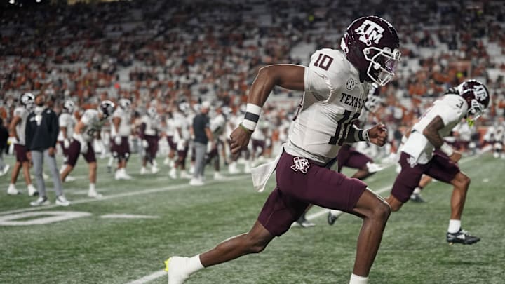 Nov 22, 2025; Austin, Texas, USA; Texas A&M Aggies quarterback Marcel Reed (10) warms up before a game against the Texas Longhorns at Darrell K Royal-Texas Memorial Stadium. Mandatory Credit: Scott Wachter-Imagn Images Nov 22, 2025; Austin, Texas, USA; Texas A&M Aggies quarterback Marcel Reed (10) warms up before a game against the Texas Longhorns at Darrell K Royal-Texas Memorial Stadium. Mandatory Credit: Scott Wachter-Imagn Images