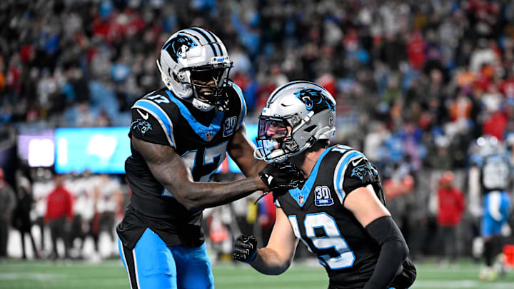 Dec 1, 2024; Charlotte, North Carolina, USA; Carolina Panthers wide receiver Adam Thielen (19) celebrates with wide receiver Xavier Legette (17) after scoring. a touchdown to take the lead with 30 seconds left in the fourth quarter at Bank of America Stadium. Mandatory Credit: Bob Donnan-Imagn Images