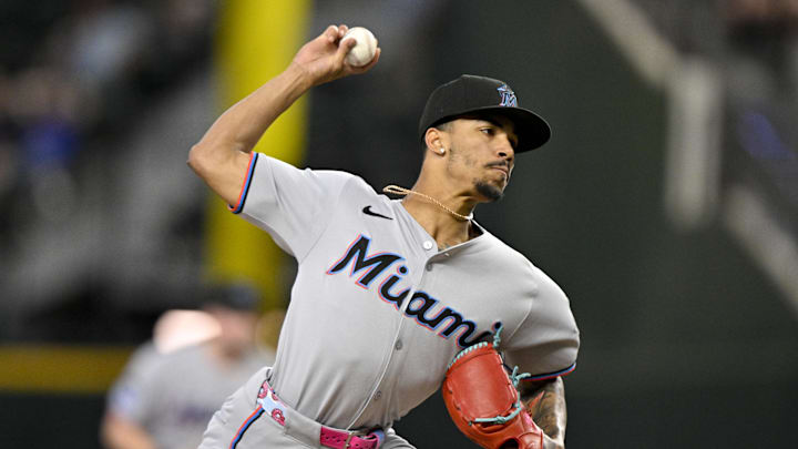Sep 21, 2025; Arlington, Texas, USA; Miami Marlins relief pitcher Ronny Henriquez (32) pitches against the Texas Rangers during the seventh inning at Globe Life Field.