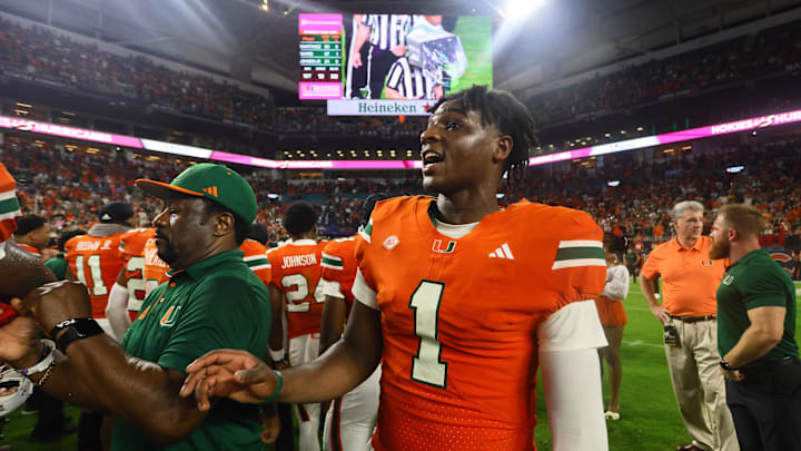 Sep 27, 2024; Miami Gardens, Florida, USA; Miami Hurricanes quarterback Cam Ward (1) looks on from the field as officials review the last play of the game against the Virginia Tech Hokies at Hard Rock Stadium. Mandatory Credit: Sam Navarro-Imagn Images