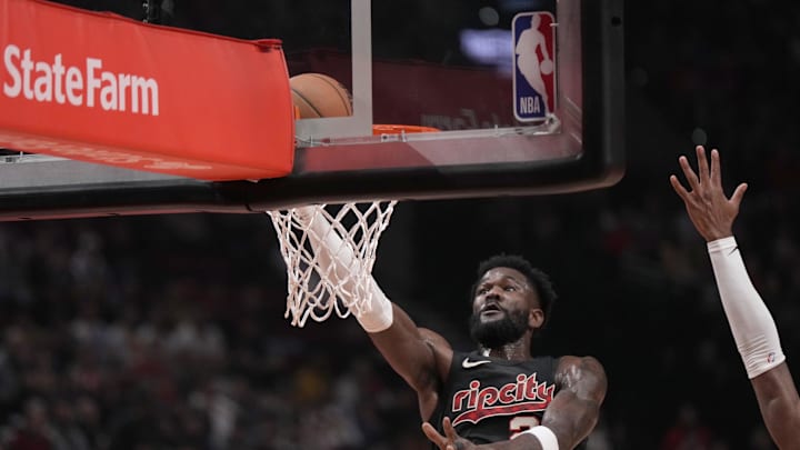 Nov 17, 2023; Portland, Oregon, USA; Portland Trail Blazers center Deandre Ayton (2) shoots the ball past Los Angeles Lakers power forward Rui Hachimura (28, right) during the first half at Moda Center. Mandatory Credit: Soobum Im-Imagn Images