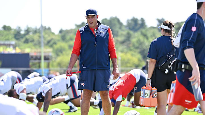 Jul 23, 2025; Foxborough, MA, USA; New England Patriots head coach Mike Vrabel watches over players during training camp at Gillette Stadium. Mandatory Credit: Eric Canha-Imagn Images