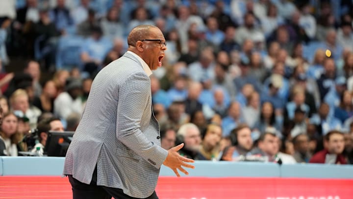 Jan 25, 2025; Chapel Hill, North Carolina, USA;  North Carolina Tar Heels head coach Hubert Davis reacts in the first half at Dean E. Smith Center. Mandatory Credit: Bob Donnan-Imagn Images