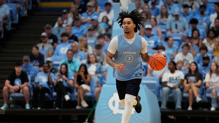 Oct 12, 2024; Chapel Hill, NC, USA;  North Carolina Tar Heels guard Elliot Cadeau (3) dribbles upcourt in the first half at the Dean E. Smith Center. Mandatory Credit: Bob Donnan-Imagn Images