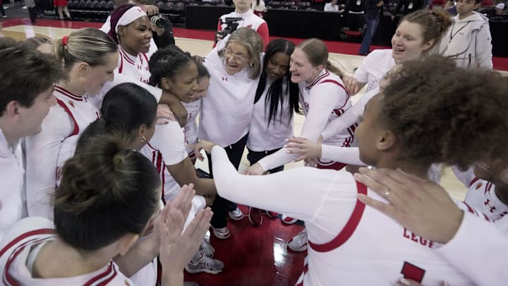 Wisconsin head coach Robin Pingeton is show with her team after their overtime win Sunday, January 18, 2026 at the Kohl Center in Madison, Wisconsin. Wisconsin beat Oregon 94-92 in double overtime.