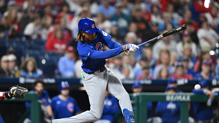 Sep 25, 2024; Philadelphia, Pennsylvania, USA; Chicago Cubs outfielder Kevin Alcantara (13) hits an infield single against the Philadelphia Phillies in the ninth inning at Citizens Bank Park.