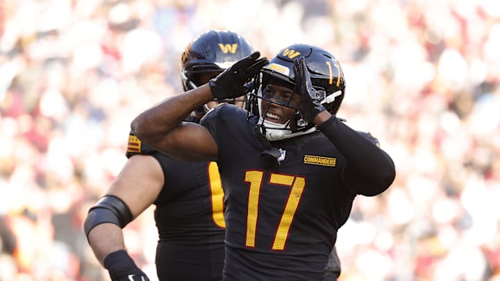 Washington Commanders wide receiver Terry McLaurin celebrates after scoring a touchdown against the Tennessee Titans. Mandatory Credit: Amber Searls-Imagn Images