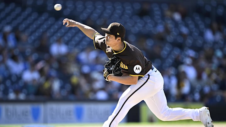 Mar 26, 2024; San Diego, California, USA; San Diego Padres relief pitcher Woo-Suk Go (21) throws a pitch against the Seattle Mariners during the ninth inning at Petco Park. Mandatory Credit: Orlando Ramirez-USA TODAY Sports