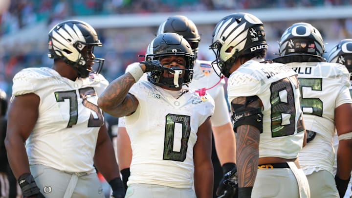 Jan 1, 2026; Miami Gardens, FL, USA; Oregon Ducks running back Jordon Davison (0) reacts after scoring a touchdown against the Texas Tech Red Raiders during the second half of the 2025 Orange Bowl and quarterfinal game of the College Football Playoff at Hard Rock Stadium. Mandatory Credit: Sam Navarro-Imagn Images Jan 1, 2026; Miami Gardens, FL, USA; Oregon Ducks running back Jordon Davison (0) reacts after scoring a touchdown against the Texas Tech Red Raiders during the second half of the 2025 Orange Bowl and quarterfinal game of the College Football Playoff at Hard Rock Stadium. Mandatory Credit: Sam Navarro-Imagn Images